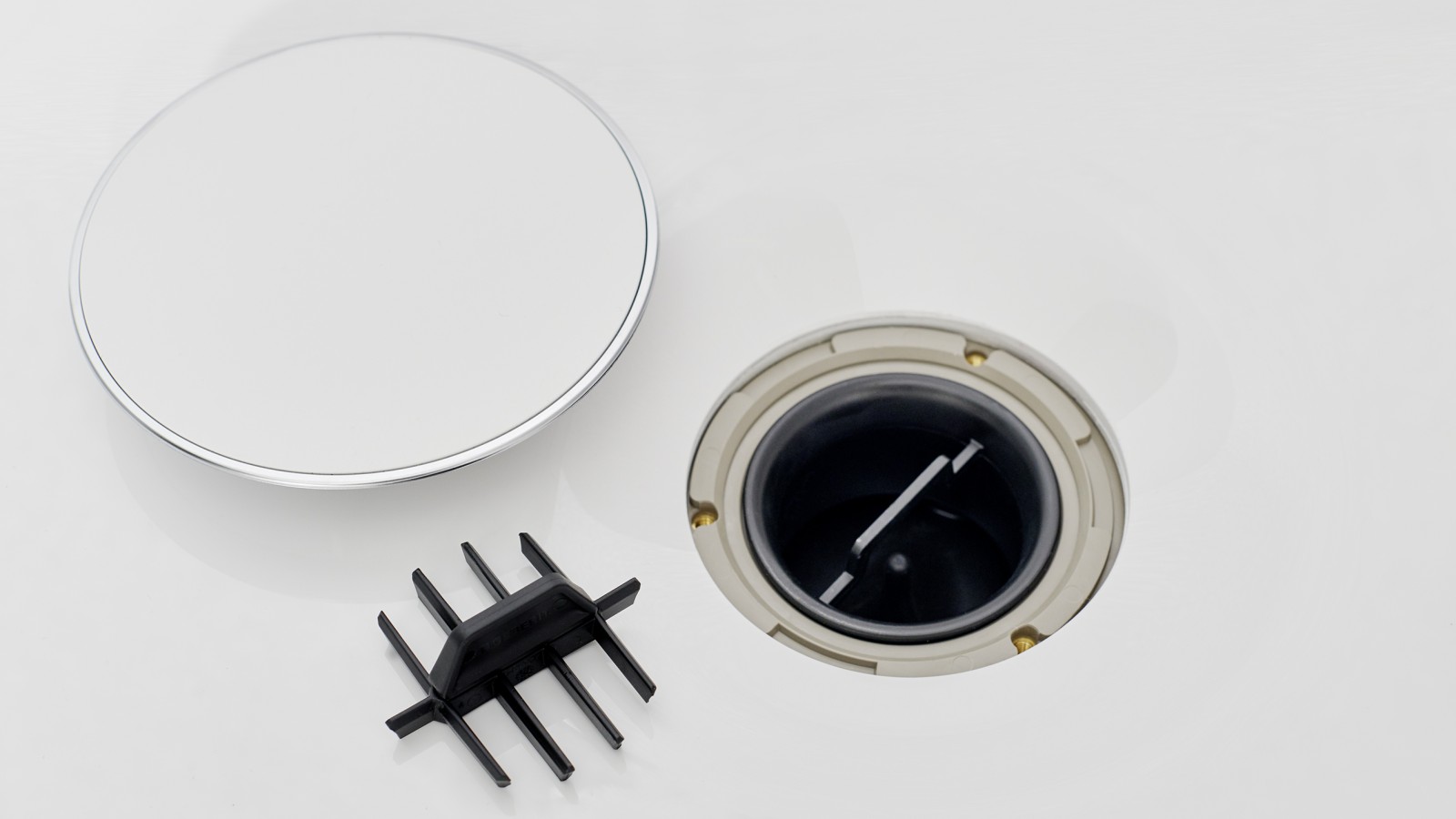 Poklopac odvoda i češljasti umetak